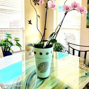 This item was sold. Yours will be almost identical. Hand crafted pot for plants.